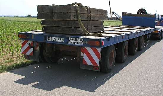 Schmidbauer Semitrailer mit Unterleghölzern  - Copyright: www.olli80.de